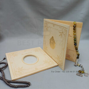 ornate white wedding invitation with embossed floral patterns (copy)