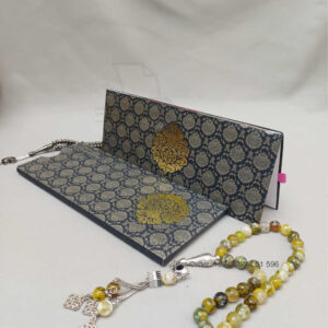 ornate white wedding invitation with embossed floral patterns (copy)