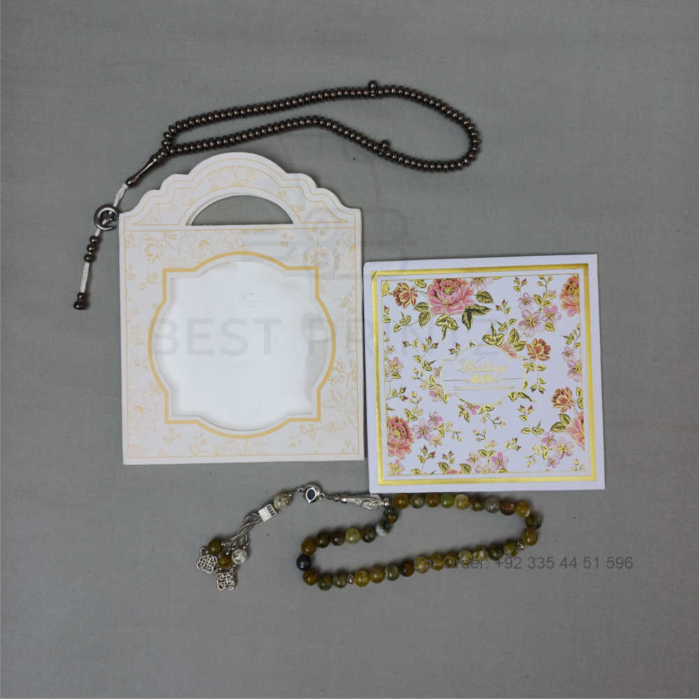 ornate white wedding invitation with embossed floral patterns (copy) ornate white wedding invitation with embossed floral patterns (copy)