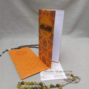 ornate white wedding invitation with embossed floral patterns (copy)