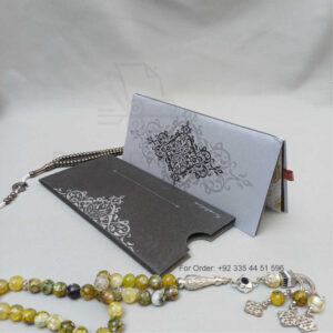 ornate white wedding invitation with embossed floral patterns (copy)