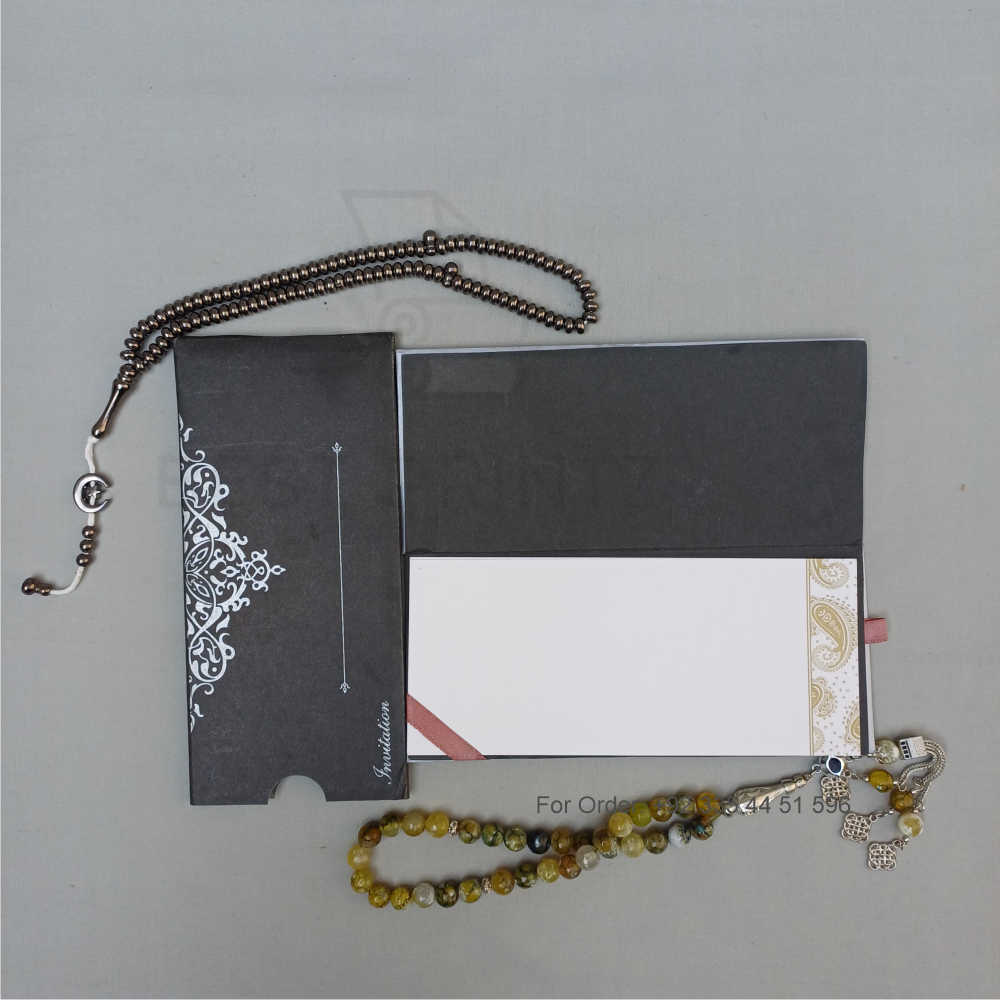 ornate white wedding invitation with embossed floral patterns (copy) ornate white wedding invitation with embossed floral patterns (copy)