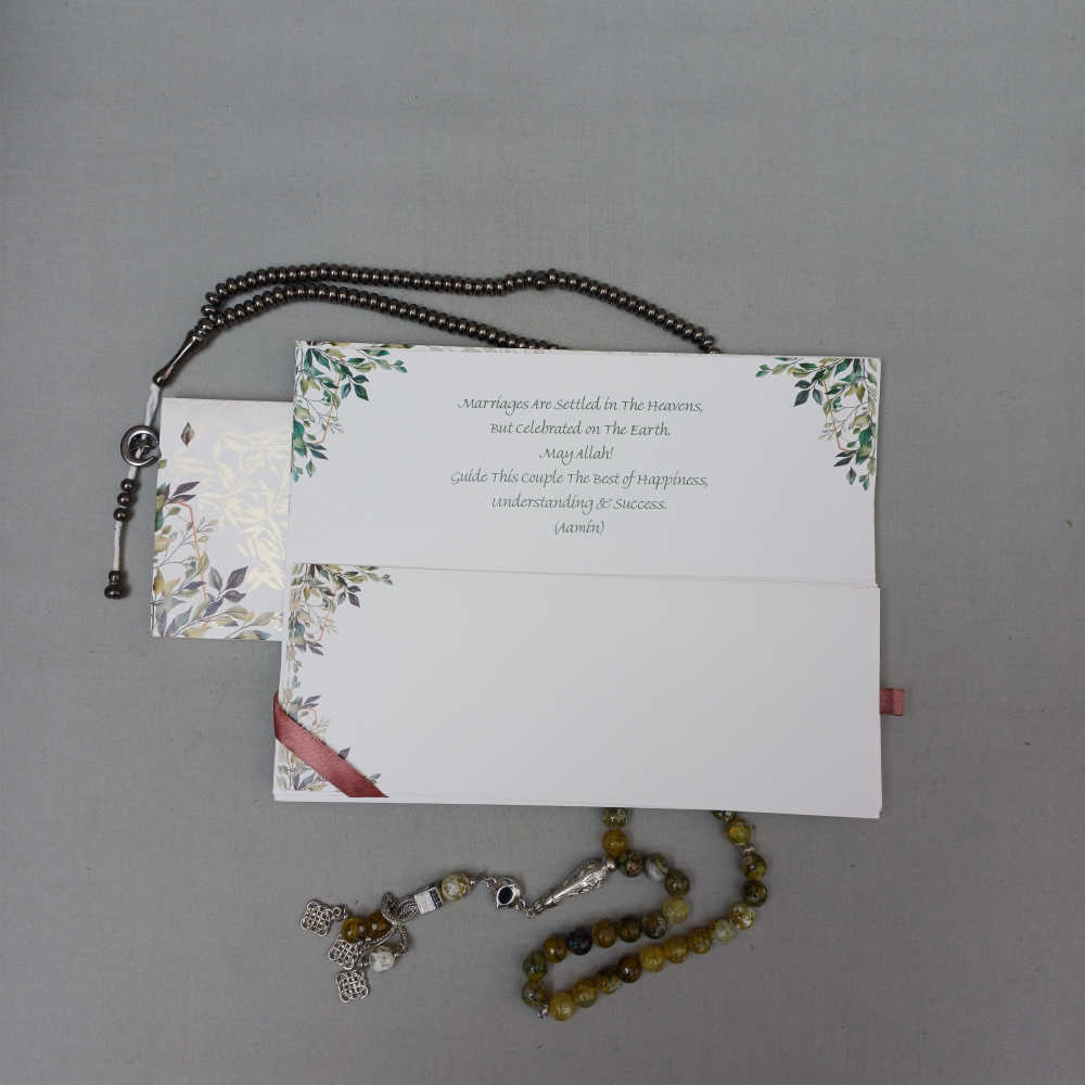 ornate white wedding invitation with embossed floral patterns (copy) ornate white wedding invitation with embossed floral patterns (copy)