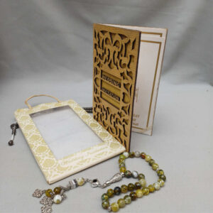 ornate white wedding invitation with embossed floral patterns