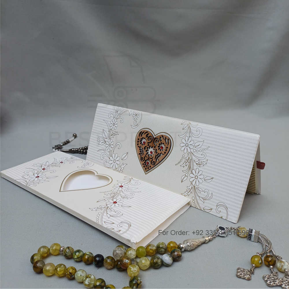 ornate white wedding invitation with embossed floral patterns (copy) ornate white wedding invitation with embossed floral patterns (copy)