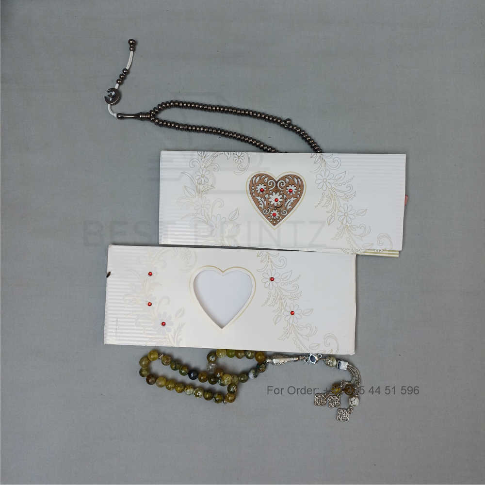 ornate white wedding invitation with embossed floral patterns (copy) ornate white wedding invitation with embossed floral patterns (copy)