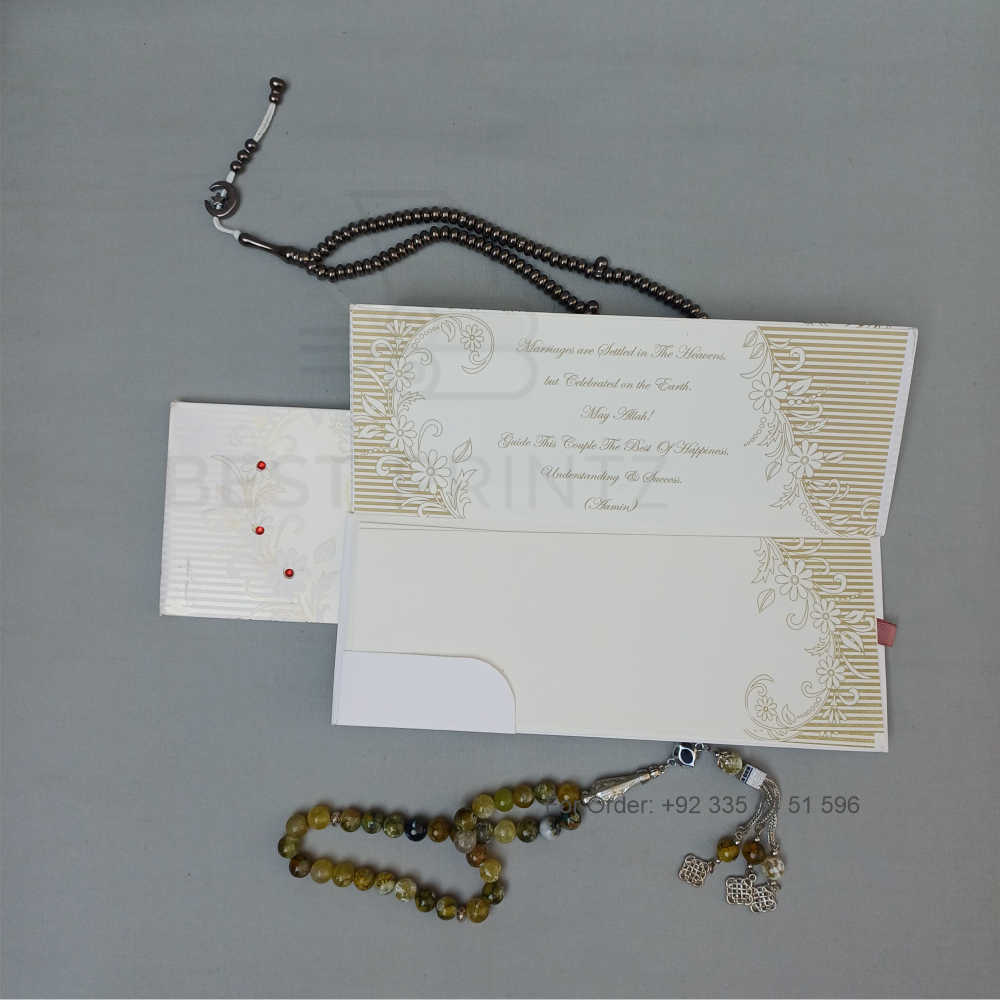 ornate white wedding invitation with embossed floral patterns (copy) ornate white wedding invitation with embossed floral patterns (copy)