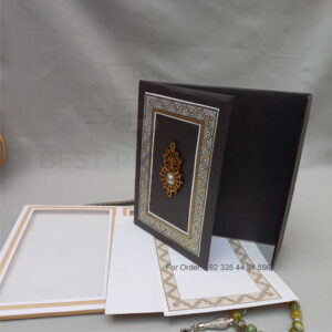 ornate white wedding invitation with embossed floral patterns (copy)
