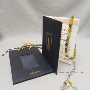 ornate white wedding invitation with embossed floral patterns (copy)