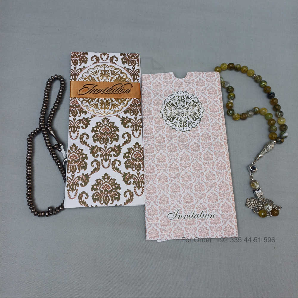 ornate white wedding invitation with embossed floral patterns (copy) ornate white wedding invitation with embossed floral patterns (copy)