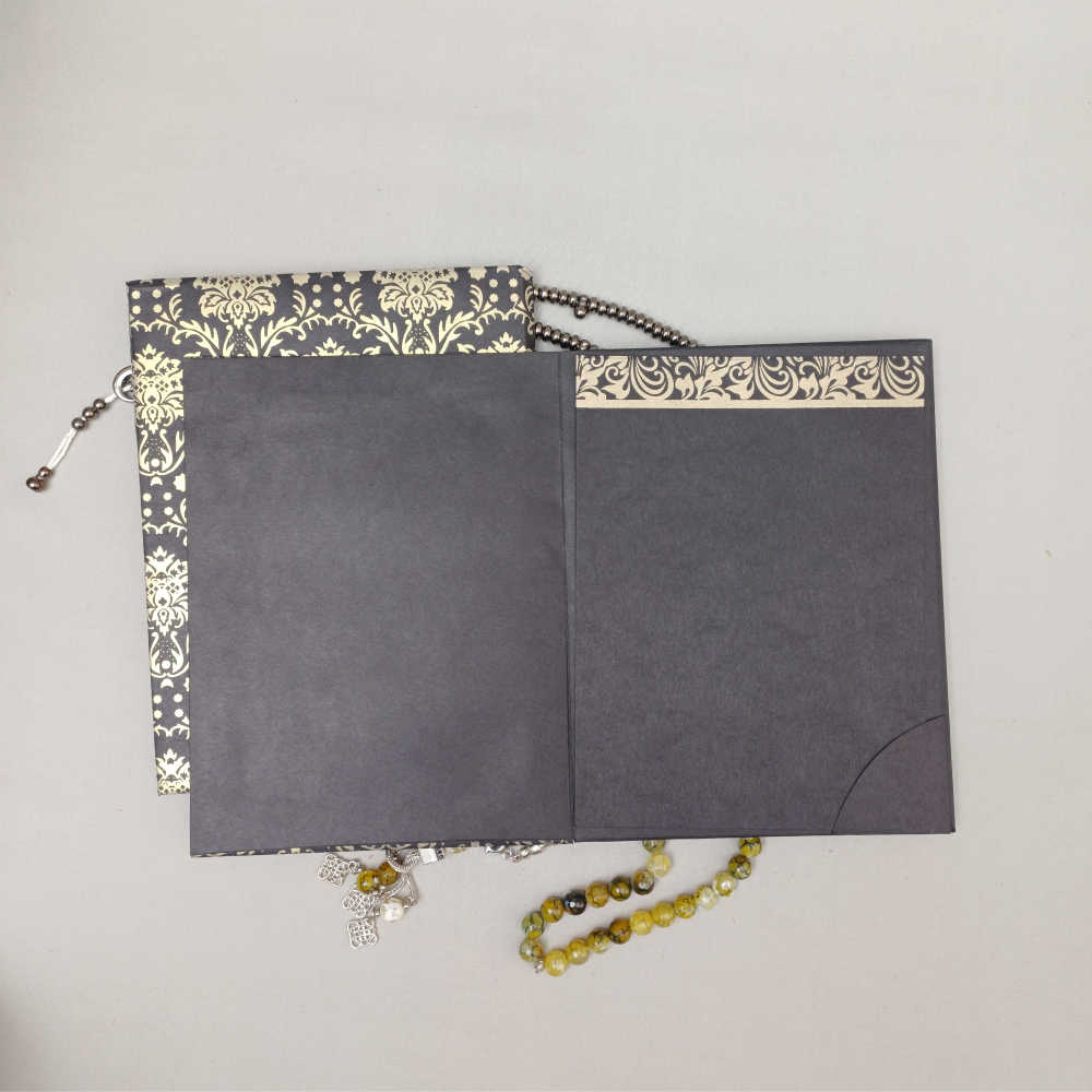 ornate white wedding invitation with embossed floral patterns (copy) ornate white wedding invitation with embossed floral patterns (copy)