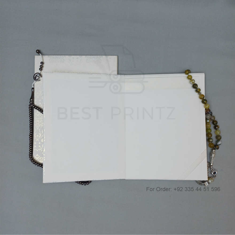 ornate white wedding invitation with embossed floral patterns (copy) ornate white wedding invitation with embossed floral patterns (copy)