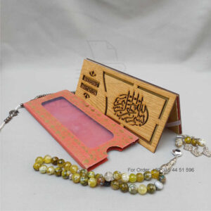 ornate white wedding invitation with embossed floral patterns (copy)