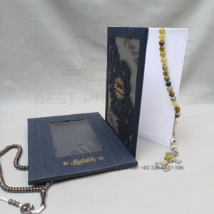 ornate white wedding invitation with embossed floral patterns (copy)