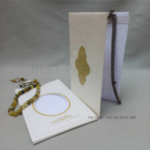 ornate white wedding invitation with embossed floral patterns (copy)