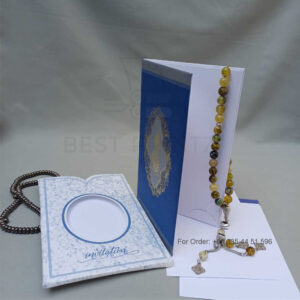 ornate white wedding invitation with embossed floral patterns (copy)