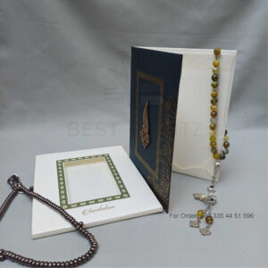 ornate white wedding invitation with embossed floral patterns (copy)