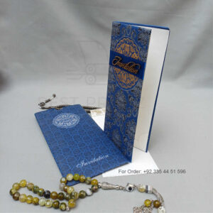 ornate white wedding invitation with embossed floral patterns (copy)