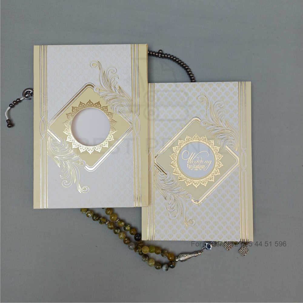 ornate white wedding invitation with embossed floral patterns (copy) ornate white wedding invitation with embossed floral patterns (copy)