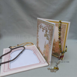 ornate white wedding invitation with embossed floral patterns (copy)