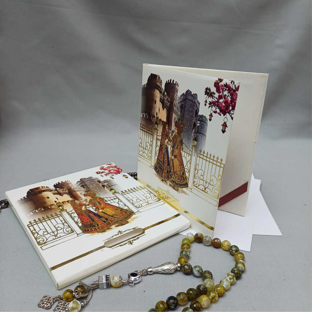 ornate white wedding invitation with embossed floral patterns (copy) ornate white wedding invitation with embossed floral patterns