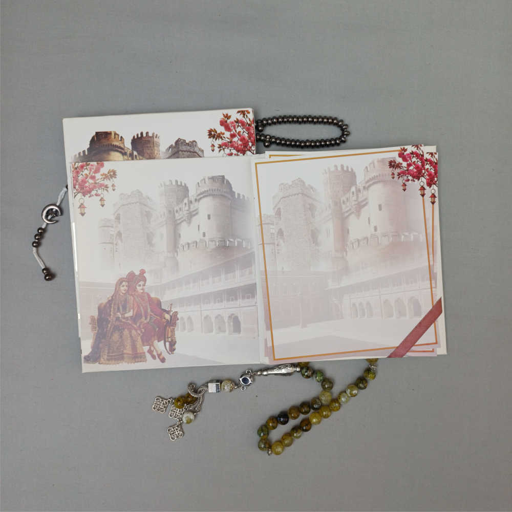 ornate white wedding invitation with embossed floral patterns (copy) ornate white wedding invitation with embossed floral patterns (copy)