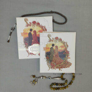 ornate white wedding invitation with embossed floral patterns (copy)