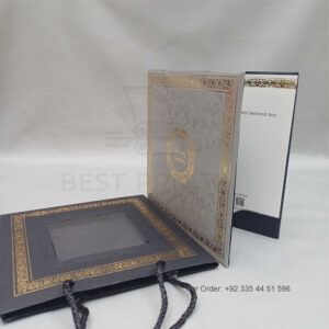 a white envelope containing a wedding invitation card tied with a string (copy)