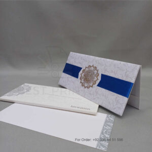 a white envelope containing a wedding invitation card tied with a string (copy)