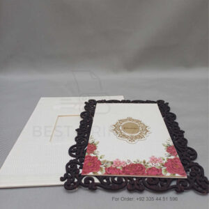 a white envelope containing a wedding invitation card tied with a string (copy)