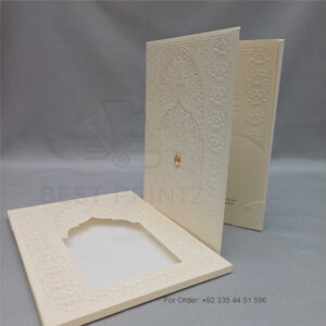 a white envelope containing a wedding invitation card tied with a string (copy)