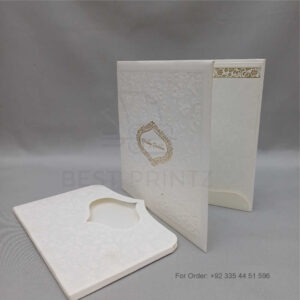a white envelope containing a wedding invitation card tied with a string (copy)