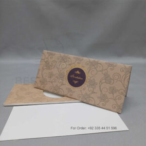 a white envelope containing a wedding invitation card tied with a string (copy)