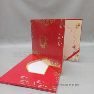 a white envelope containing a wedding invitation card tied with a string (copy)