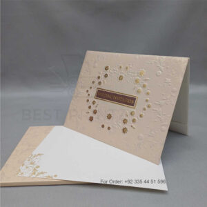 a white envelope containing a wedding invitation card tied with a string (copy)