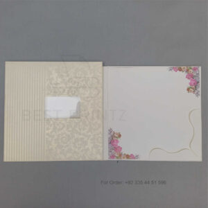 a white envelope containing a wedding invitation card tied with a string (copy)