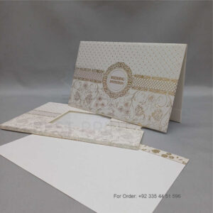 a white envelope containing a wedding invitation card tied with a string (copy)