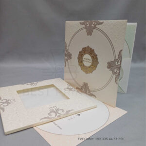 a white envelope containing a wedding invitation card tied with a string (copy)