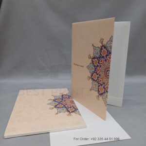 a white envelope containing a wedding invitation card tied with a string (copy)