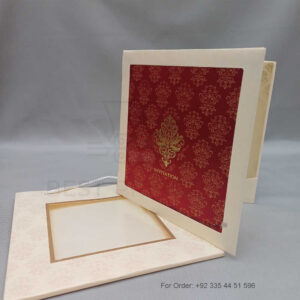 a white envelope containing a wedding invitation card tied with a string (copy)