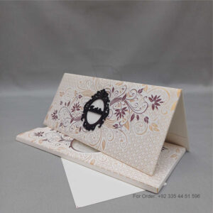 a white and gold wedding invitation card featuring an elegant floral design